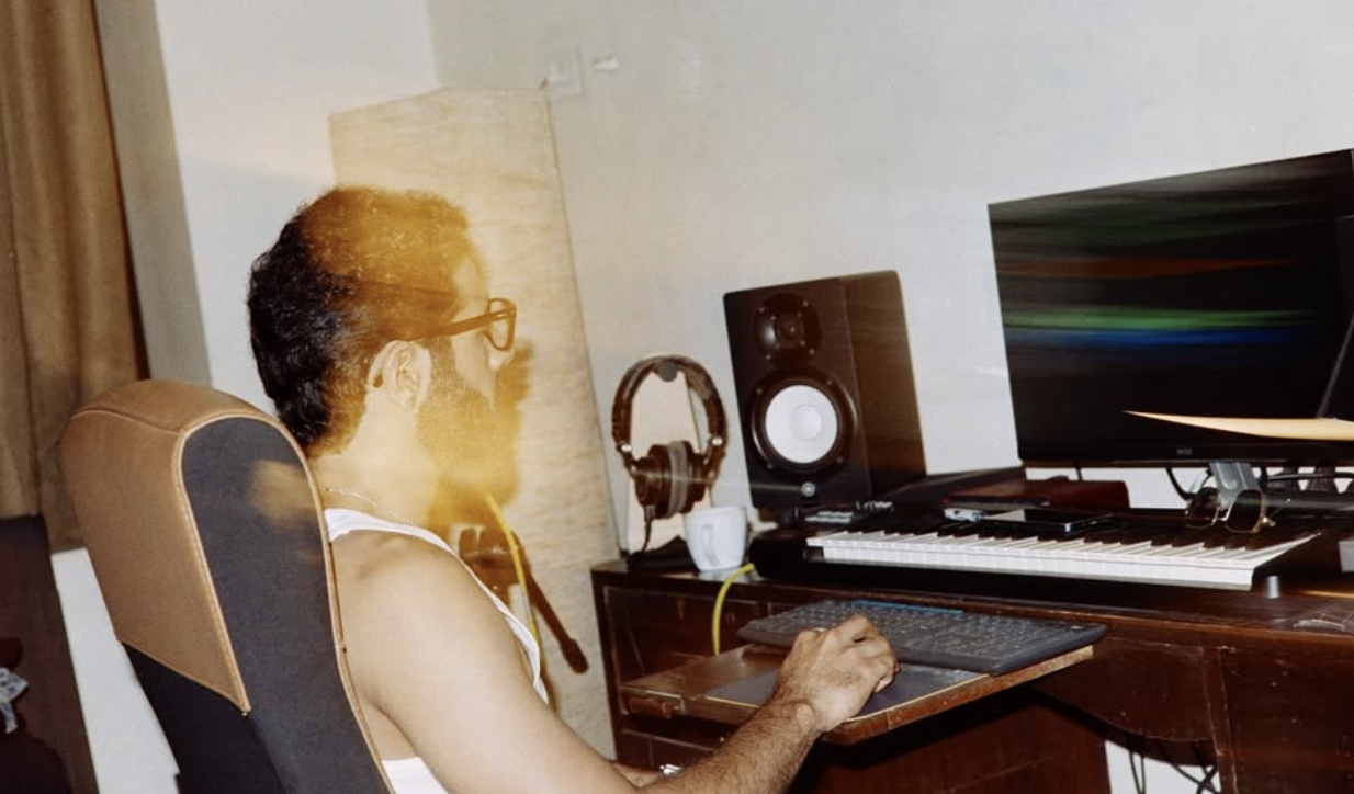 Azamaan at the keyboard rig with light leak